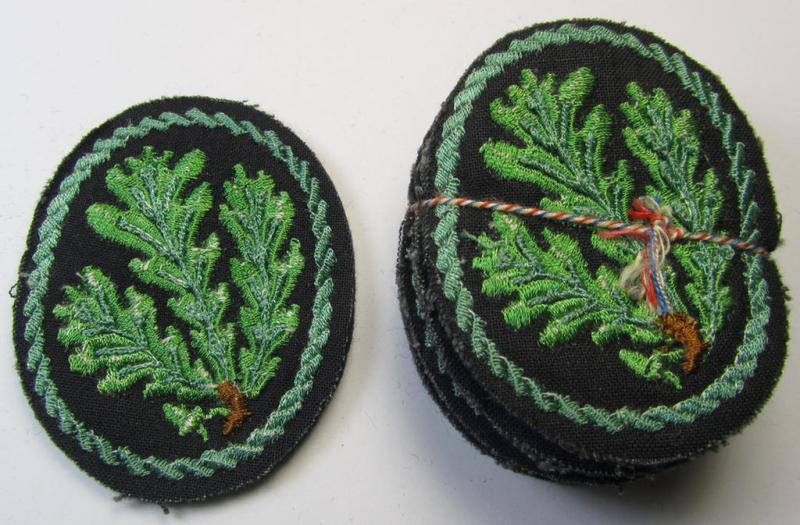 Attractive example of a WH (Heeres) so-called: 'Jäger'-armbadge, being a neatly machine-embroidered- and/or multi-coloured version as was executed on darker-green-coloured wool