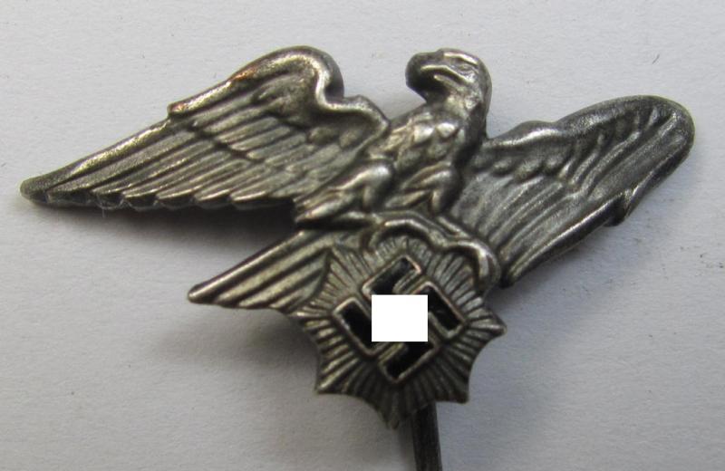 Semi-enamelled RLB- (ie. 'Reichluftschützbund') 'Amtsträger-Abzeichen' ie.: civil-attire badge (of the second pattern) being a maker- (ie. 'HA'-) marked example that is additionally bearing a patent-pending- (ie. 'Ges.Gesch.'-) marking on its...