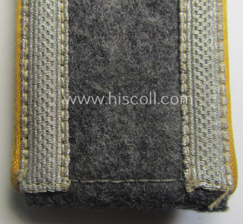 Single, mid- (ie. later-) war-period WH (Heeres) NCO-type shoulderstrap as piped in the golden-yellow- (ie. 'goldgelbener'-) coloured branchcolour as was intended for usage by an: 'Uffz. der Flieger o. Fallschirm-Trpn.'