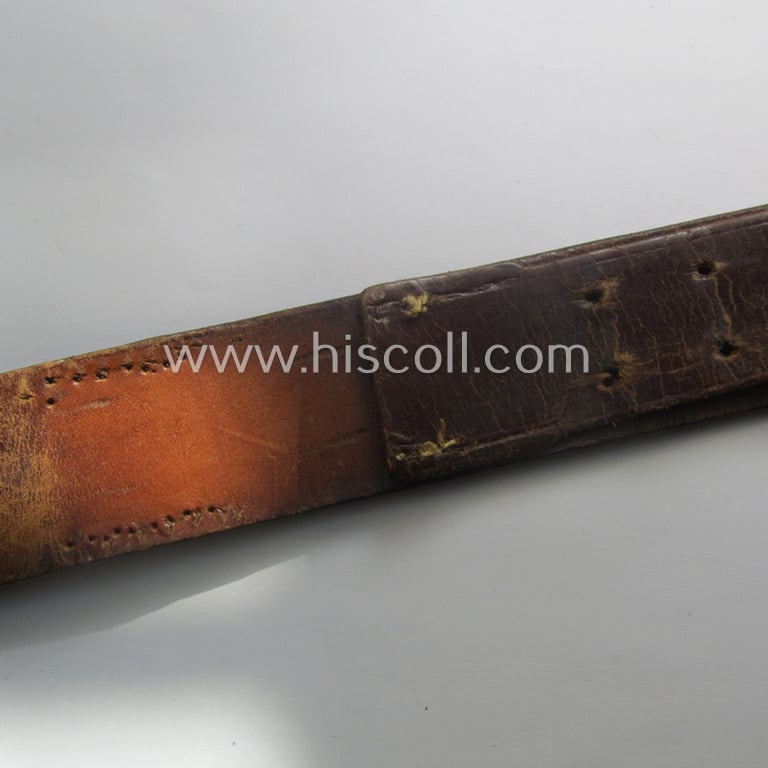 WWI-period (ie. 'Preussen'-related), copper- (ie. nickle-crome-) based, EM/NCO-type belt-buckle being a moderately used example that comes with its accompanying belt as issued and/or most certainly worn