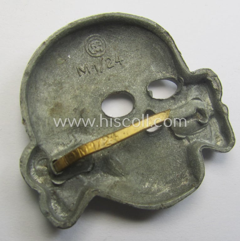 Superb - albeit regrettably parly incomplete but nevertheless rarely encountered! - 'Waffen-SS' visor-cap skull (ie. 'Totenkopf für Schirmmütze') being a detailed- and/or maker- (ie. 'RzM M1/24'-) marked example