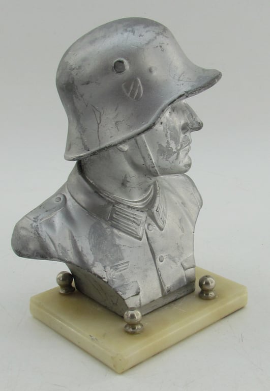 “German Wehrmacht soldier bust desk decoration on marble base.”