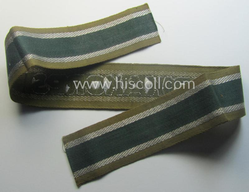 'BeVo'-like cuff-title (ie. 'Ärmelstreifen') entitled: 'Afrikakorps' being a presumably issued but simply never worn example that comes in an overall very nice- (ie. non-shortened- and never tunic-attached-), condition
