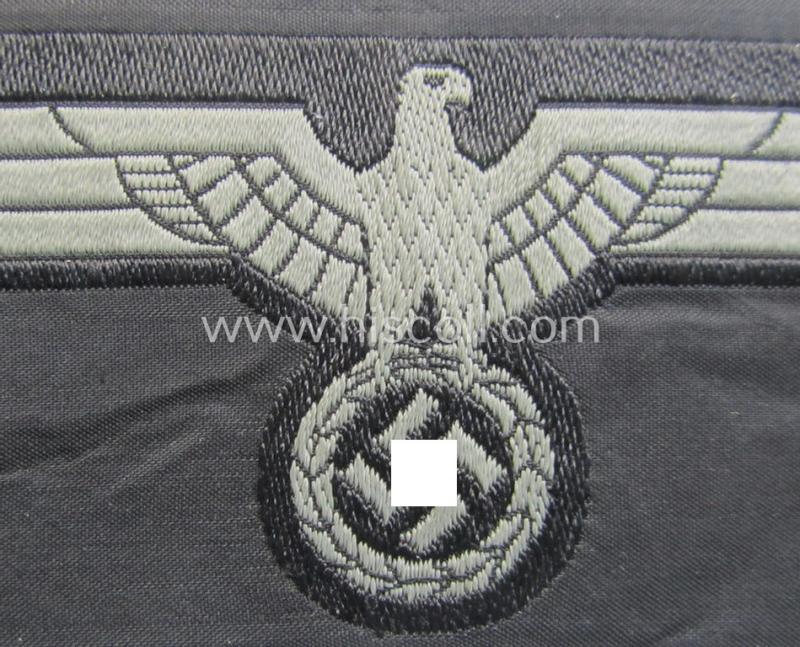 Later- (ie. mid-war-) period, WH (Heeres) 'Panzer'-type breast-eagle (ie. 'Brustadler für Panzertruppen') being a 'virtually mint- ie. unissued' example as executed in bluish-grey-coloured linnen on a black-coloured background
