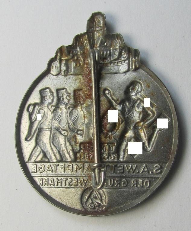 Commemorative, silvered tin-based so-called: SA- (ie. 'Sturmabteilungen'-) related 'tinnie' being a non-maker-marked example showing some marching storm-troopers and text: 'S.A. Wettkampftage der Gruppe Westmark - Trier - 26.27.6.1937'