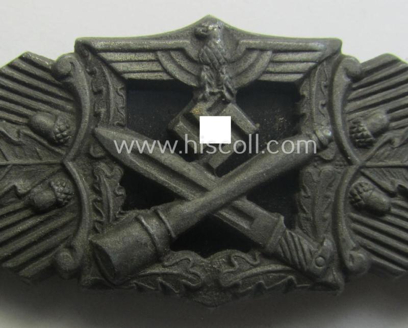 'Nahkampfspange in Bronze' (or: bronze-class close-combat clasp ie. CCC) being a neatly maker-marked- and/or minimally converse-shaped specimen as was produced by the: 'JFS'- (ie. 'Joseph Feix u. Söhne'-) company