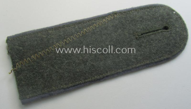 Single, WH (Heeres) EM-type 'cyphered' (M40-pattern) shoulderstrap: 'Soldat des Nachschub-Abtlgs. 2'