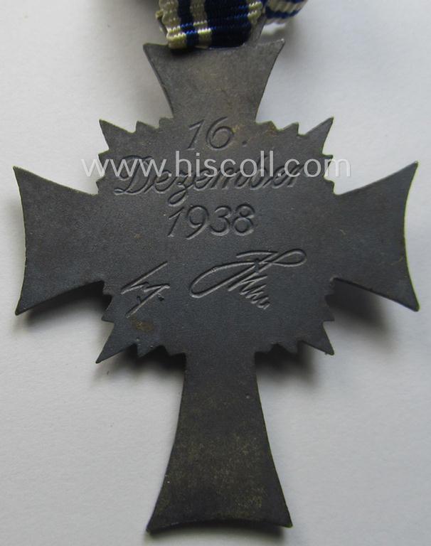 'Ehrenkreuz der deutschen Mutter - zweite Stufe' (or: silver-class mothers'-cross) that came mounted onto its long-sized ribbon and that came stored in its period pouch by the maker: 'E. Ferd. Wiedmann - Frankfurt a. M.'