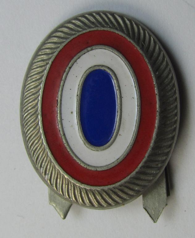 Attractive - and not that often seen! - Dutch WWII-period-, police- (ie. 'Schalkhaar Politie') side- (ie. visor-cap-) cocarde (ie. 'Schiffchen-Kokarde') as was specifically used on the black-coloured, Dutch-police-related head-gear