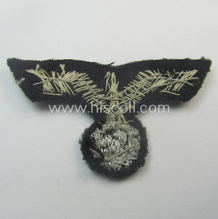 Clearly used- and/or cap-removed, WH (Heeres) officers'-pattern, visor-cap eagle/cocarde-set (ie. 'Effektensatz für Schirmmütze') being both hand-embroidered examples that come mounted onto a darker-green-coloured- and/or woolen-based background