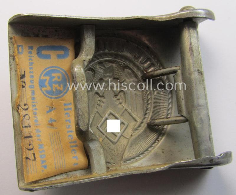 Attractive, HJ (ie. 'Hitlerjugend') silver-coloured- (ie. typically steel-based and 'crank-catch-variant'-pattern) belt-buckle being a neatly maker- (ie. 'RzM M4/42'-) marked example that comes in a just moderately used- ie. worn condition, as...