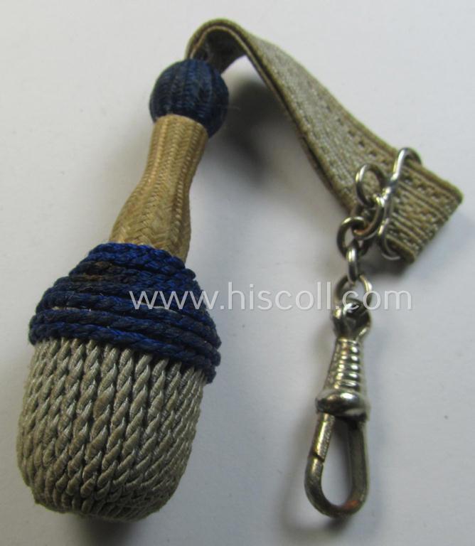Attractive, smaller-sized (ie. miniature) so-called: 'watch-fob' (ie. key-holder) as executed in the form of a darker-blue-/white-coloured NCO-type side-arm knot (ie. 'Portepee' or: 'Troddel') as was used for the various WH-type bayonets