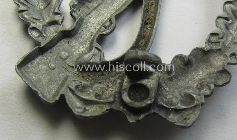 'Infanterie Sturmabzeichen in Silber', being an unmarked (and/or very converse- ie. vaulted-) 'hollow-back' example by the maker: 'Friedrich Linden' (ie. 'F.L.L.') as was executed in silver-coloured, zinc-based metal (ie. 'Feinzink')