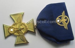 Golden-class 'Pol.-Dienstauszeichnung 1. Stufe' (or: police loyal-service medal...