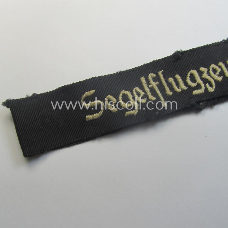 Superb - and actually rarely encountered! - example of the HJ- ('Hitlerjugend' ie. 'Flieger-Hitlerjugend'-) cuff-title (ie. 'Ärmelstreifen') entitled: 'Segelflugzeugführer' being an example as executed in the machine-embroidered pattern