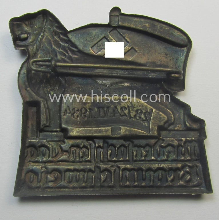 Early-period, 'N.S.D.A.P.'-related day-badge (ie. 'tinnie' or: 'Veranstaltungsabzeichen') being a non-maker-marked example depicting a lion and swastika-flag coupled with the text: 'Niedersachsen-Tag - Braunschweig - 23./24.VI.1934'