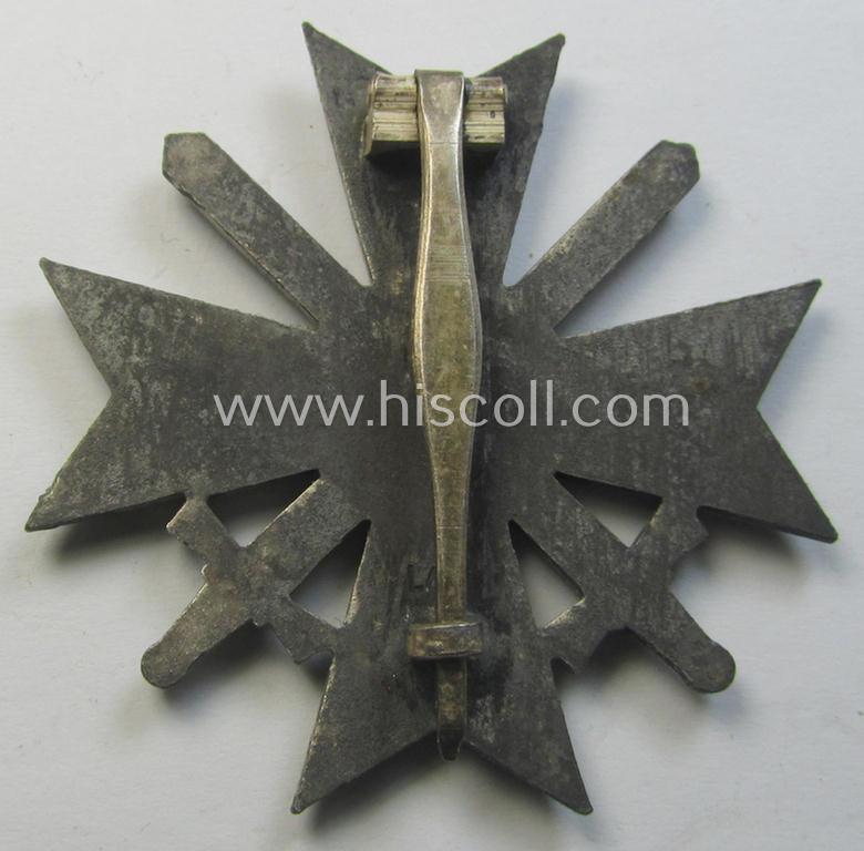 Attractive, 'KvK 1. Klasse mit Schwertern' being a clearly maker- (ie. 'L/13'-) marked specimen that is executed in silverish-grey-coloured and/or zinc-based metal (ie. 'Feinzink') as produced by the 'Hersteller' (ie. maker): 'Paul Meybauer...