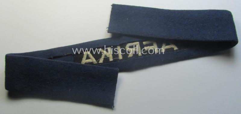 Darker-blue toned, WH (Luftwaffe) cuff-title (ie. 'Ärmelstreifen') entitled: 'Afrika' (being a full-length example that comes in an issued-, used and/or carefully tunic-removed, condition)