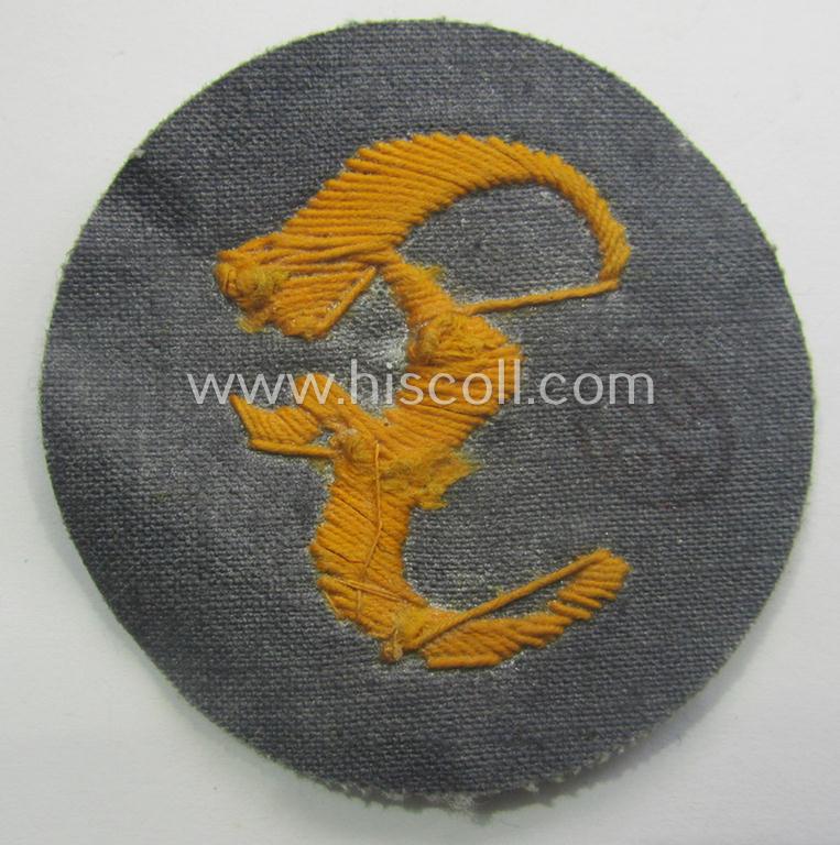 WH (Heeres) so-called: trade- and/or special-career arm-insignia (ie. 'Laufbahn- o. Tätigkeitsabzeichen') as was specifically intended for an army: 'Feuerwerker' (ie. artician)