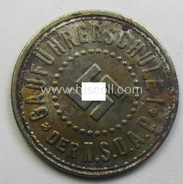 Unusual, TR-period commemorative-token (ie. 'Erinnerungs- o. tragbare Medaille') showing a detailed swastika-device and bearing the text: 'Gut für eine Flasche Bier - Gauführerschule I der N.S.D.A.P.'
