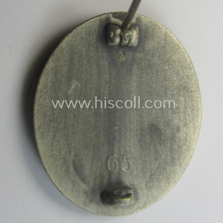 Silver-class wound-badge (or: 'Verwundeten-Abzeichen in Silber') being a maker- (ie. '65'-) marked example as was produced by the 'Hersteller' ie. maker: 'Klein u. Quenzer'
