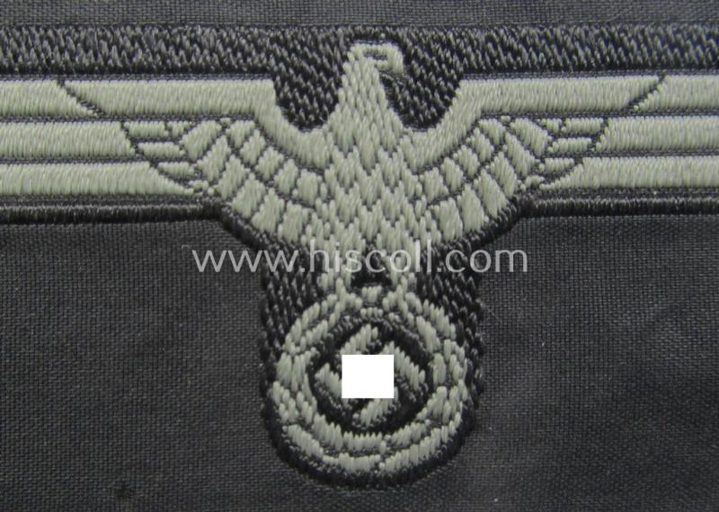 WH (Heeres) later- (ie. mid-war-) period- and/or bluish-grey-coloured 'Panzer'-type side-cap-eagle a executed in the neat 'BeVo'-weave pattern onto a typical black-coloured background