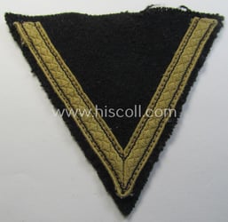 Truly used, Waffen-SS-type 'Armwinkel' (or: rank-chevron) as executed...