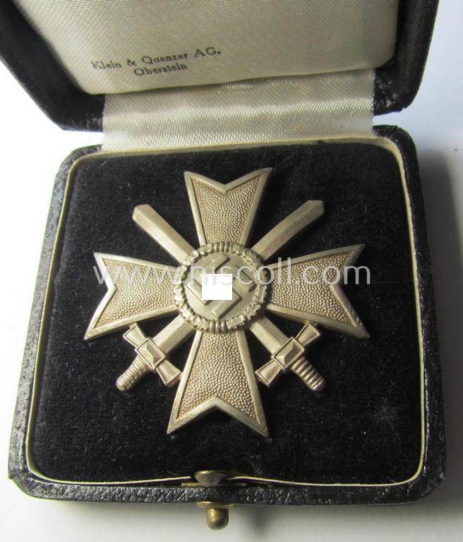 Superb, 'Kriegsverdienstkreuz 1. Klasse mit Schw.' being a maker- (ie. '65'-) marked (and/or 'Buntmetall'-based!) specimen by the maker: (ie. 'Hersteller') 'Klein u. Quenzer' that comes stored in its original, luxuriously-styled KvK-etui