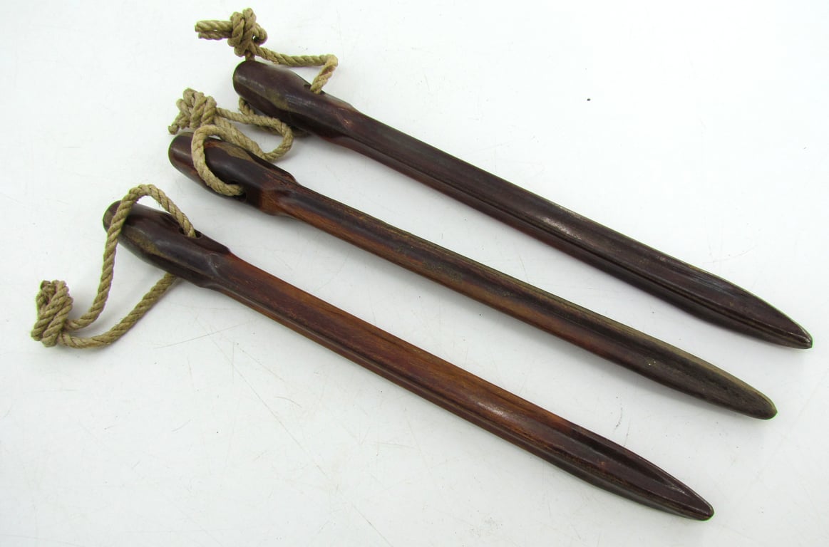 Matching set of 3 Bakelite tent pegs
