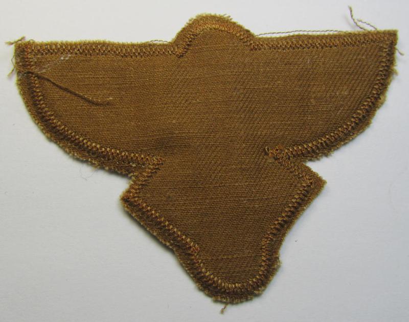 Tan-coloured, so-called: N.S.F.K.- (or: 'National Socialistisches Flieger Korps') breast-eagle being a nicely woven- (and enlisted-mens'-pattern) example that comes mounted on its piece of tan-coloured linnen