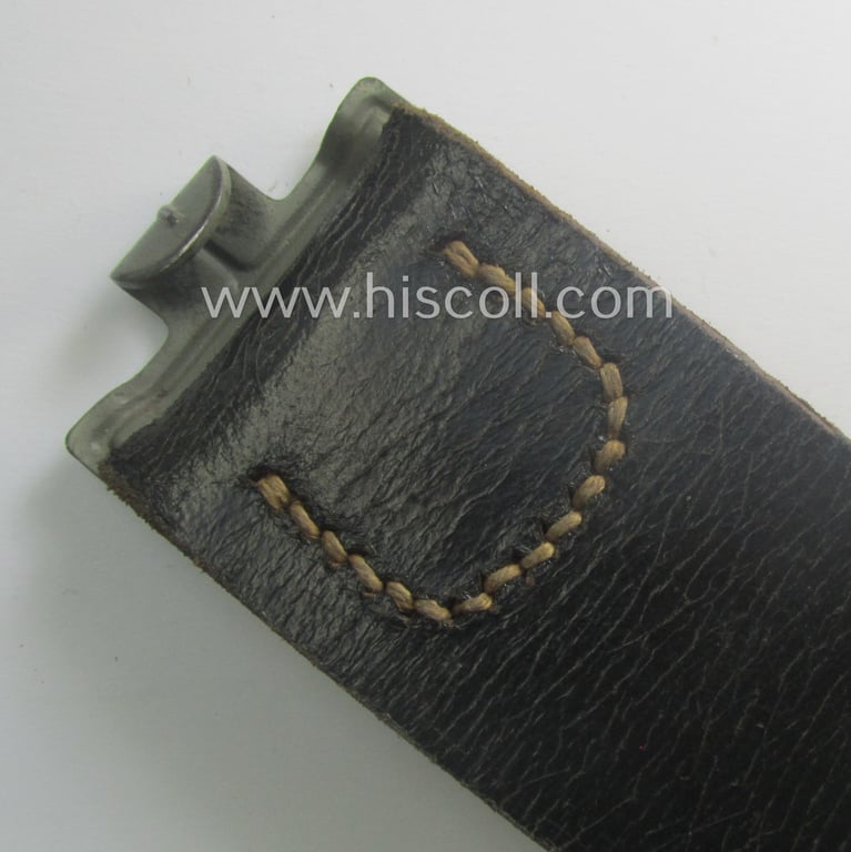 Hardly used, early- (ie. mid-) war-period, black-coloured WH (Heeres, Luftwaffe, Waffen-SS etc.) 'standard-issue'-pattern belt (ie. 'Koppelriemen') being a 115 cms. sized example that shows a (clear) makers'-designation and/or date: '1942'