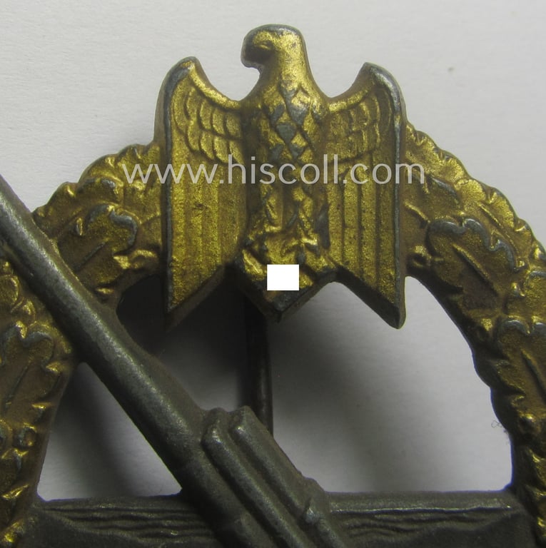 WH (KM) 'Marine-Artillerie-Abzeichen' being a maker- (ie. 'F.L.L. - 43'-) marked- and/or zinc- (ie. 'Feinzink'-) based example by the: 'Friedrich Linden'-company