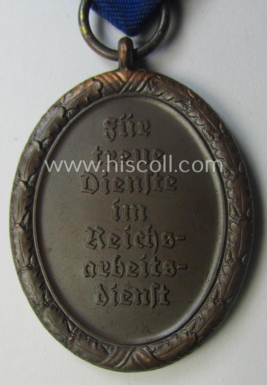 RAD (ie. 'Reichsarbeitsdienst'): 'Dienstauszeichnung 4. Stufe für Männer' as was intended for 4 years loyal-service and that comes mounted onto its period (broad-sized) ribbon (ie. 'Bandabschnitt')
