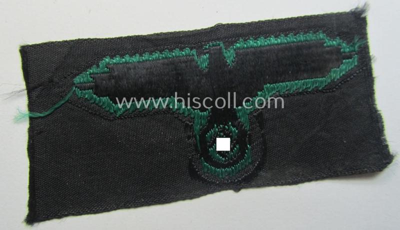 Typical reed-green-coloured, Waffen-SS, 'BeVo'-woven-styled cap-eagle (ie. 'Mützenadler für Tarn-Einheitsfeldmütze')