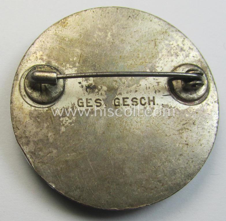 Attractive - and nicely preserved! - DRK (ie. 'Deutsches Rotes Kreuz' or German Red Cross) nurses'-helpers-badge entitled: 'Schwesternhelferin' (being an example that shows a clearly present 'Ges.Gesch.'-patent-pending marking on its back