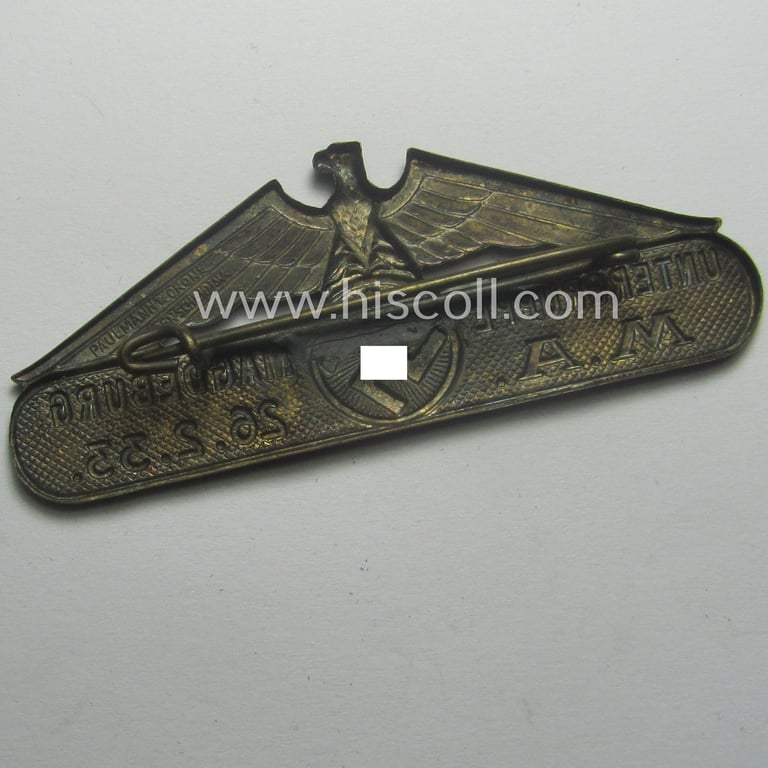 Golden-bronze-toned, early-period N.S.D.A.P.-related day-badge (ie. 'tinnie') being a maker- (ie. 'Paulmann & Crone'-) marked example as was issued to commemorate a specific party-meeting entitled: 'Untergruppe Magdeburg - M.A. - 26.2.33'