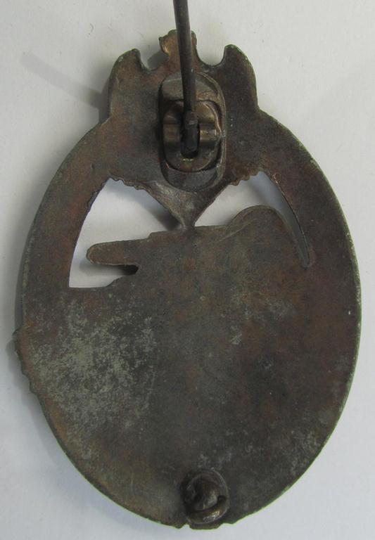 Attractive, 'Panzerkampfabzeichen in Bronze' (or: bronze-class panzer assault badge or PAB) being a neat zinc- (ie. 'Feinzink'-) version (of the so-called: 'horizontal-crimp'-variant) as was procuced by the: 'Steinhauer & Lück'-company