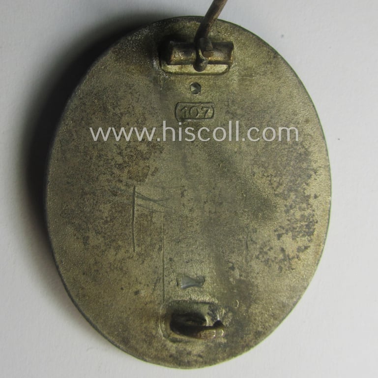 Silver-class woundbadge (or: 'Verwundeten Abzeichen in Silber') being a nicely maker- (ie. '107'-) marked example (as was produced by the desirable 'Hersteller' ie. maker: 'Carl Wild')