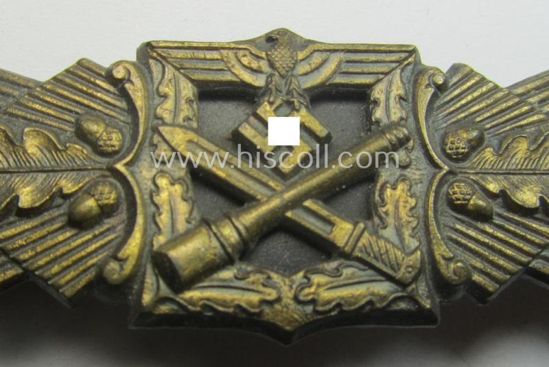 'Nahkampfspange in Bronze' (or: bronze-class close-combat clasp ie. CCC) being a maker- (ie. 'F.&B.-L.'-) marked- and/or minimally converse-shaped specimen as was produced by the maker- (ie. 'Hersteller') 'Funcke u. Brüninghaus'