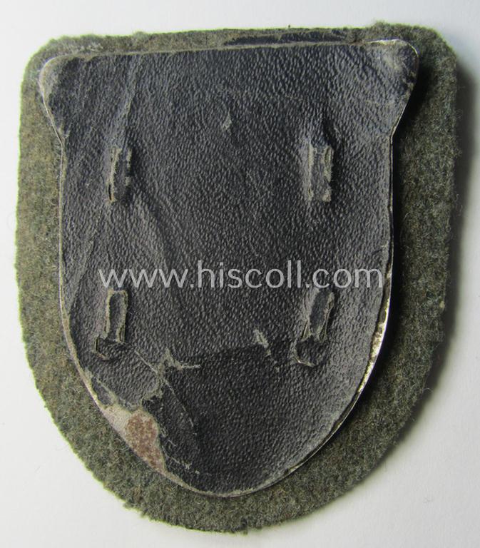 Attractive - and actually scarcely encountered! - WH (Heeres ie. Waffen-SS) 'Kuban'-campaign-shield that comes mounted onto its original field-grey-coloured- and/or woolen-based 'backing'