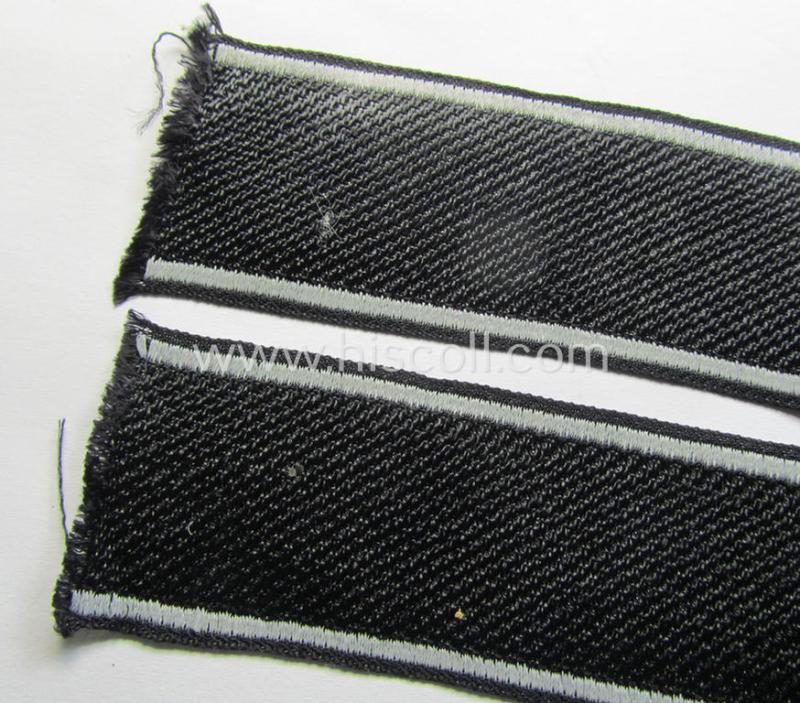 Superb, Waffen-SS, 1943/44 pattern cuff-title (ie. 'Ärmelstreifen') depicting the machine-woven Latin script text in silver-grey linnen as was intended for a member serving within the: '23. SS Freiwilligen Panzer Grenadier Division' ('Nederland...