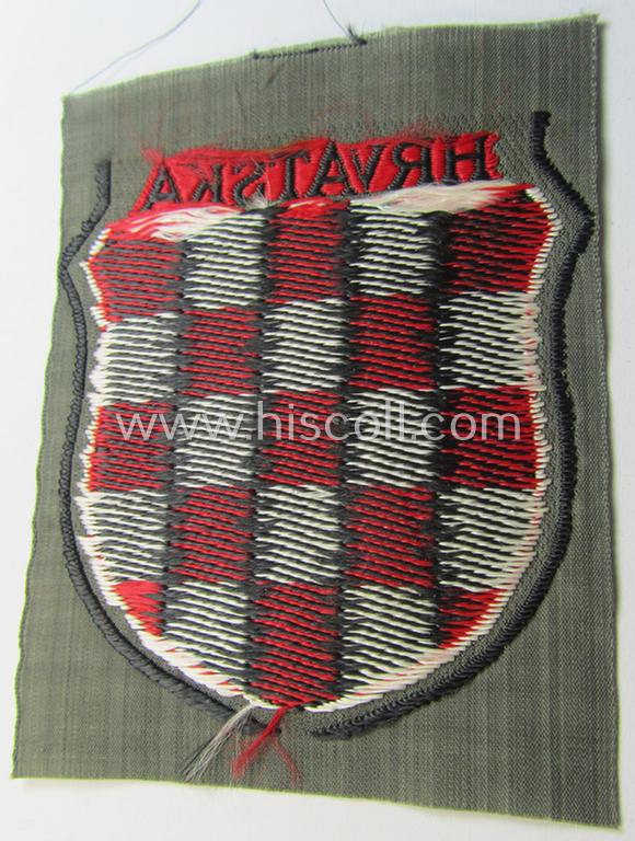 Superb, multi-coloured- and/or 'BeVo'-woven armshield (ie. 'Ärmelschild') entitled: 'Hrvatska' as was intended for usage by a volunteer who served within the 'Deutsche Wehrmacht' ie. within the 'Kroatische Legion'