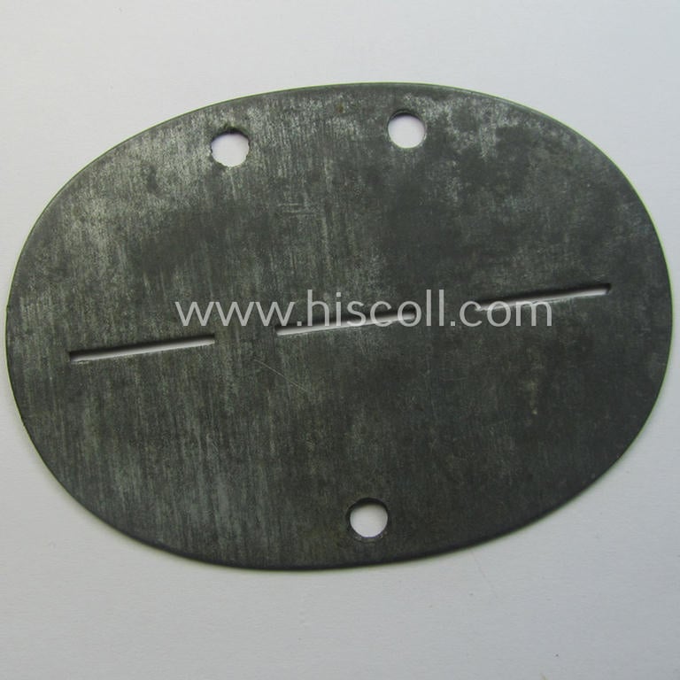 Zinc-based, WH (Heeres) 'Infanterie'-related ID-disc bearing the clearly stamped unit-designation that simply reads: 'J.G.Ers.Kp.mot 128' (part of the: '178. Panzer-Division') and that comes as issued and/or worn