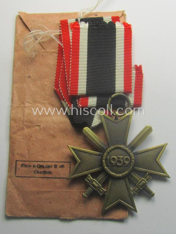 Medal-set: 'KvK 2. Klasse m. Schwn.' being a non-maker-marked specimen that came stored in its period pouch by the 'Hersteller': 'Klein & Quenzer A.G.'