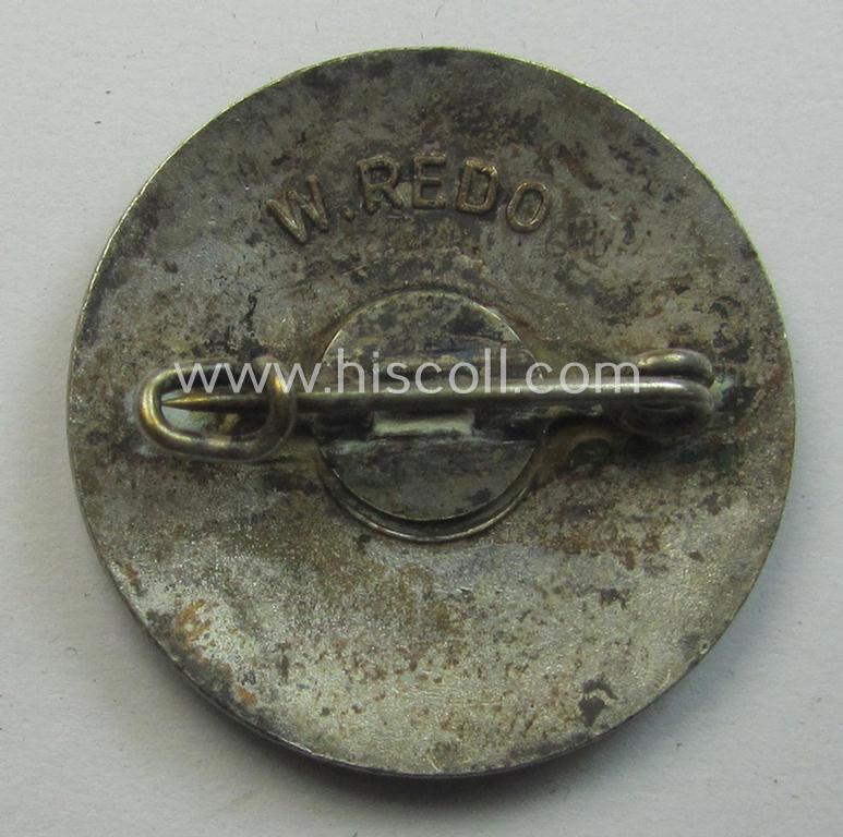 'Mitgliedsabzeichen der Deutsche Volksgemeinschaft (D.V.G.) Westmark (Lothringen)' showing the makers'-designation 'W. Redo - Saarlautern'