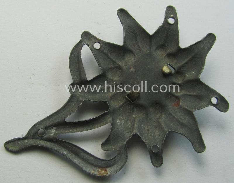 WH (Heeres) silver-greyish-coloured and zinc-based (albeit non-maker-marked) so-called: M43-cap-badge (ie. 'Mützenabzeichen') depicting an: 'Edelweiss'-flower as was used by the various 'Gebirgsjäger'- (ie. mountain-troops-) related divisional-...