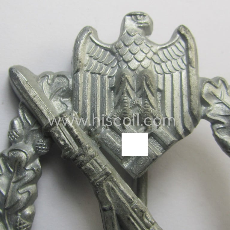 WH (Heeres- ie. Waffen-SS) 'Infanterie-Sturmabzeichen in Silber' (or: silver-class infantry assault-badge ie. IAB) being a maker- (ie. '2'- ie. 'Assmann') marked so-called: 'molded-pattern'-example as executed in zinc-based metal
