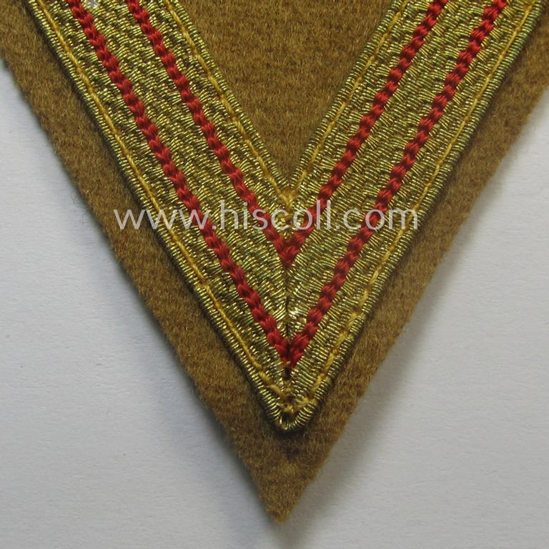Attractive - and actually scarcely encountered! - piece of SA- (ie. 'Sturmabteilungen') related arm-insignia, being a so-called: 'Ehrenwinkel für Altgediente Kämpfer o. Angehörigen der SA' (ie. honor-chevron for old campaigners)
