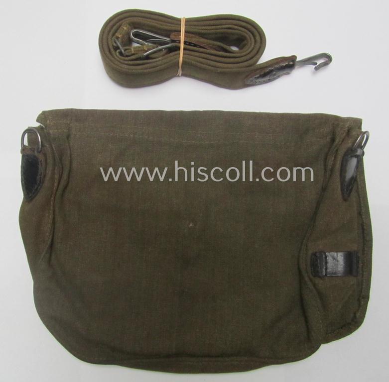 Mid- ie. later-war-period - somewhat smaller-sized and female-related - so-called: 'Brotbeutel für Nachrichtenhelferinnen' that comes mounted onto its period carrying-strap and that comes in an overall nicely preserved, condition