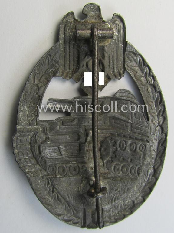 'Panzerkampfabzeichen in Silber' (or: silver-class panzer-assault badge or PAB) being a non-maker-marked- and/or hollow zinc- (ie. 'Feinzink'-) based example as was produced by the: 'Paul Meybauer'-company